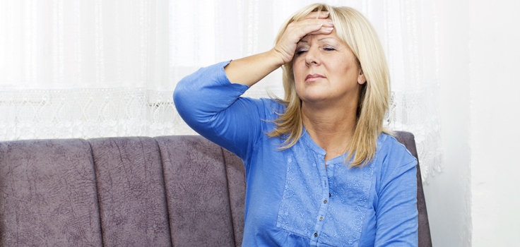 HotFlashes_WomanHoldingHead.jpg