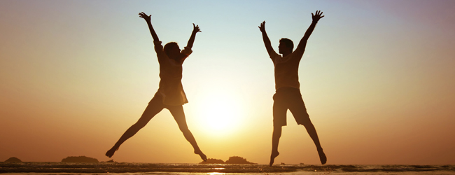 AttitudeWellness_JumpingSunsetPeople.jpg